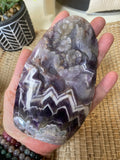 Humming Bird and Flower Carved in Chevron Amethyst