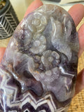 Humming Bird and Flower Carved in Chevron Amethyst