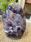 Humming Bird and Flower Carved in Chevron Amethyst